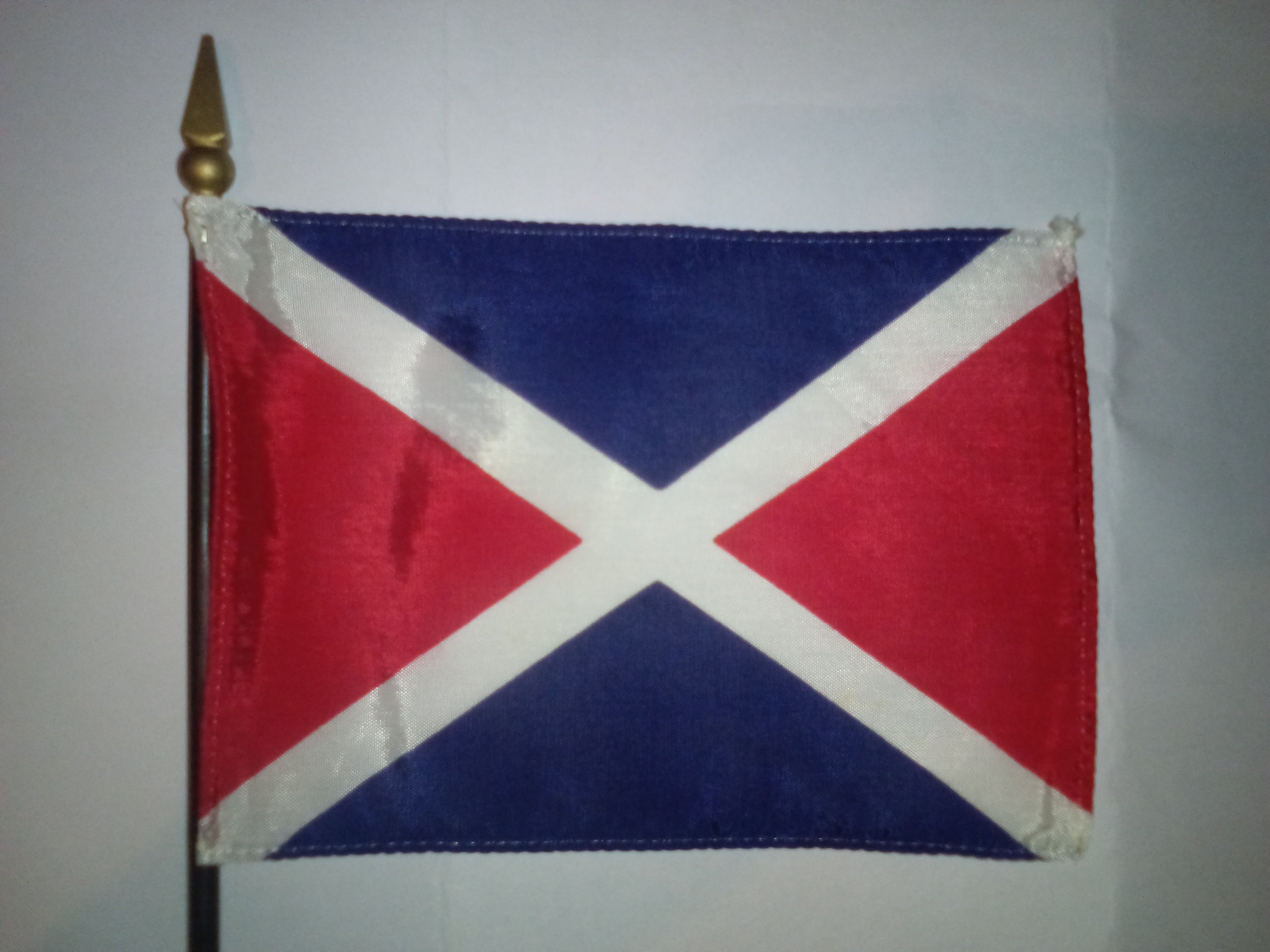 Vintage miniature short-lived 1976-1977 flag of the Seychelles.